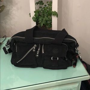 Black KIPLING cross body/ hand bag